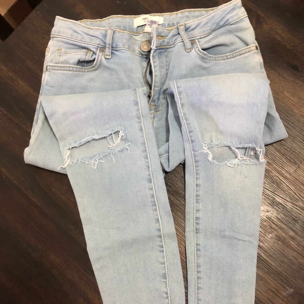 Blue wash skinny ripped jeans